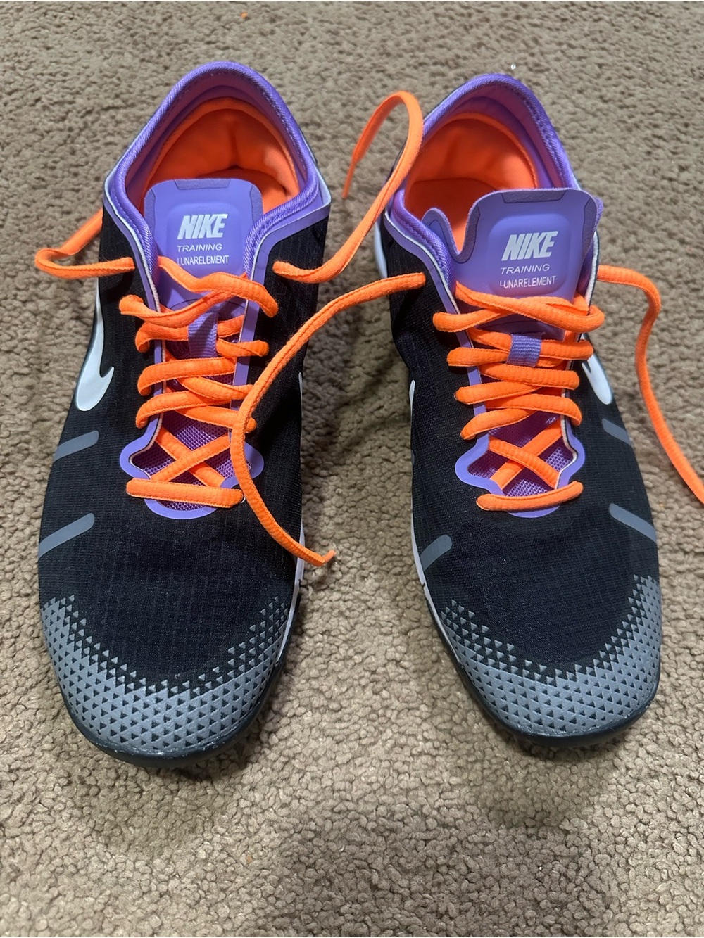 Nike Women's Black Athletic Shoes with Orange Laces & Purple Tongue